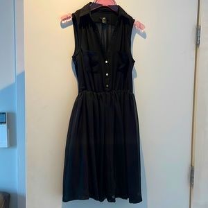 Black dress with gold buttons